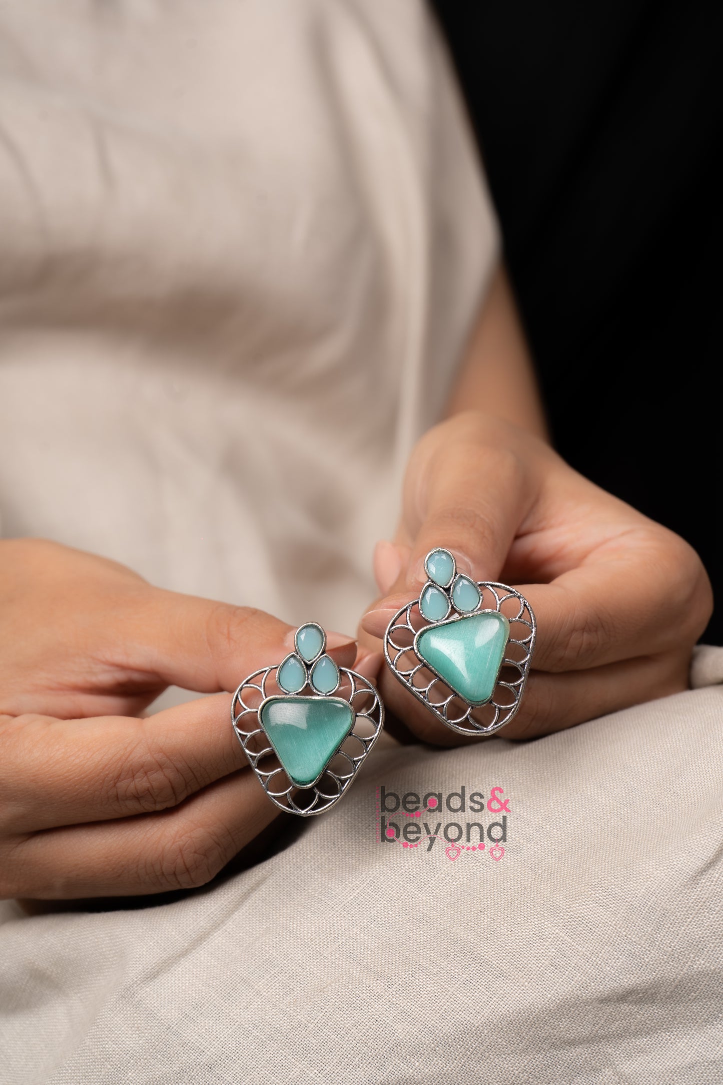 Trian Stud Earrings